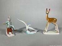 Front view of all three figurines