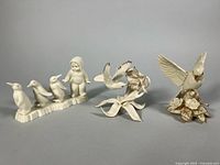 All three figurines grouped together