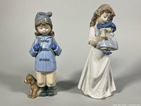 Front view of both porcelain figurines together