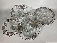 Group shot of all five silver overlay glass pieces