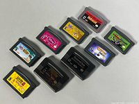 All nine GBA cartridges laid out front facing