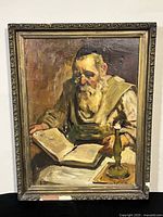 Full view of framed oil painting