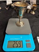Kiddush cup on scale reading 25.9 g