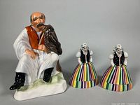 All three porcelain figurines front view