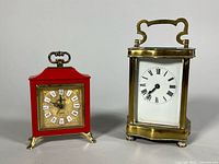 Front view of both clocks showing overall appearance
