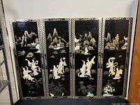 Full set of four black lacquer mother-of-pearl inlay panels