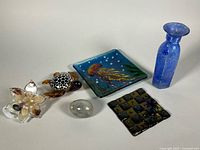 Group view of all six art-glass items