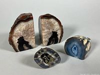 All four geode pieces: bookend pair, blue agate half, grey half with pyrite