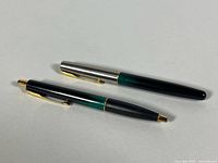 Both Parker Frontier pens side by side showing overall condition
