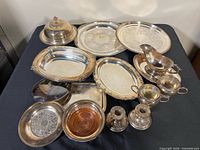 All items grouped showing variety of trays, bowls, candleholders