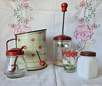 Group view showing all five vintage kitchen items