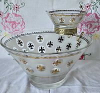 Full view of chip bowl, dip bowl mounted in metal holder showing pattern and proportions