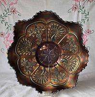 Top view showing full Peacock and Grape paneled pattern and ruffled edge