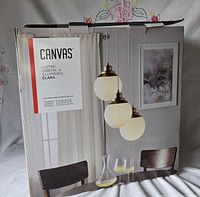 Front of sealed CANVAS Clara chandelier box
