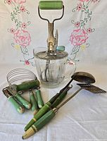 Group shot of all utensils and Ekco glass cup
