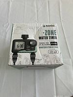 Front of box showing brand, 2-Zone Water Timer label and LCD image