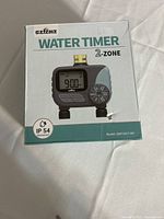 Front of box displaying water timer image and branding