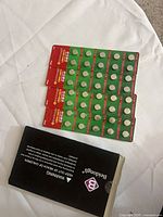 Four blister cards of Beidongli LR44/AG13 batteries with outer carton visible