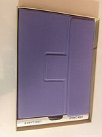 Keyboard packaging with foam insert and USB cable compartment visible