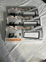 Front view of three retail boxes for Krigor RV-Dimmable LED Ceiling Light, 15 W