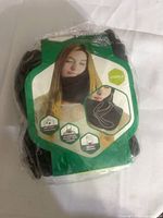 Front of sealed package showing product image and unisex label