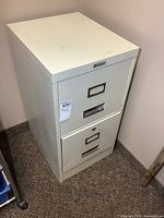 Front and side view of cabinet showing both drawers and general condition