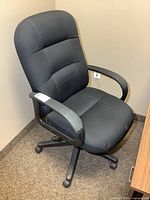 Front angled view showing overall chair design and condition