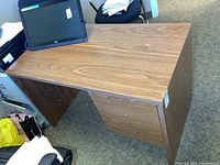 Desk front and top with monitor for scale