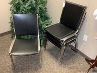 Front and side view showing one chair separate and three stacked