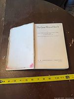 Open book showing title page with publisher and author details