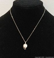 Necklace on bust showing overall design