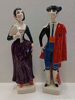 Front view of both ceramic decanters