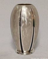 Full front view of WMF Ikora Metal vase showing shape and finish