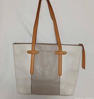 Front view of Fossil Felicity ivory and taupe leather tote handbag