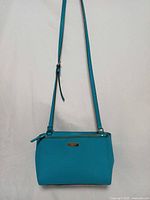 full front view showing overall shape and strap