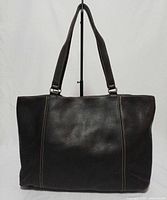 Front exterior of black leather tote