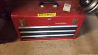 Front view of red Craftsman toolbox closed