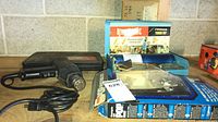 Heat gun, torch kit, rivet set and tap & die set on workbench