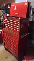 Full view of stacked Snap-on top chest on Mac Tools bottom cabinet
