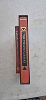Spine view showing titles The Twelve Caesars and second smaller book