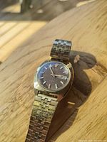 Front view of Seiko automatic watch showing dial, markers and bracelet