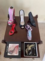 Top view showing all visible shoe figurines and boxed items