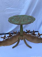 Pedestal table front with both wall shelves beneath