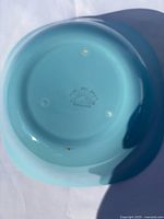 Base of turquoise bowl showing SOL England backstamp