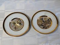 Both 4.5 in gold rimmed plates top view