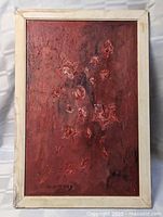 Front view of textured abstract oil painting in frame