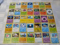 Full layout of approximately 36 Pokémon cards in six-column grid