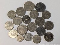 All coins spread to show faces and quantity