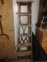 Front view of taller wooden ladder