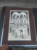 Front view of framed Escher print showing full image, mat and frame